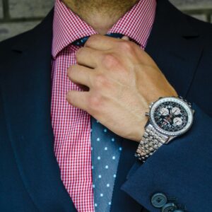 A Man in a Navy Blue Color Jacket With a Watch